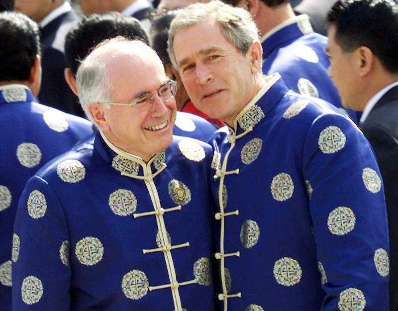 George W. cheesing at APEC via AP